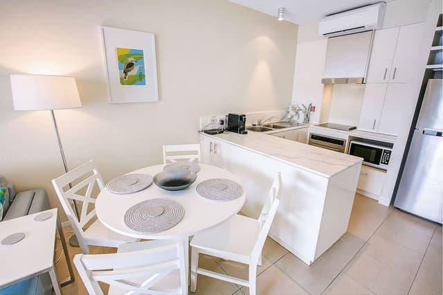 Poolview Two Bedroom Apartment with private rooftop spa