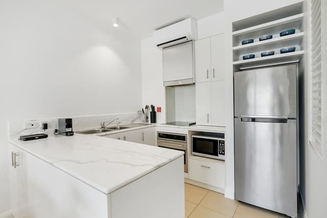 Poolview Two Bedroom Apartment with private rooftop spa
