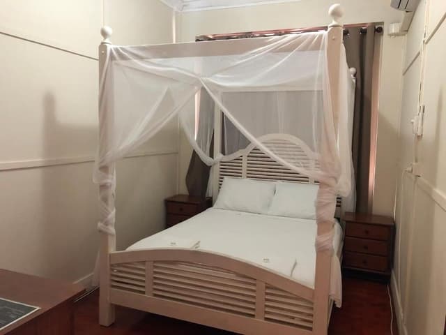 Standard Room, 1 Queen Bed, Shared Bathroom