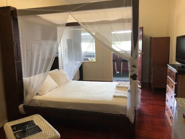 Standard Room, 1 Queen Bed, Shared Bathroom