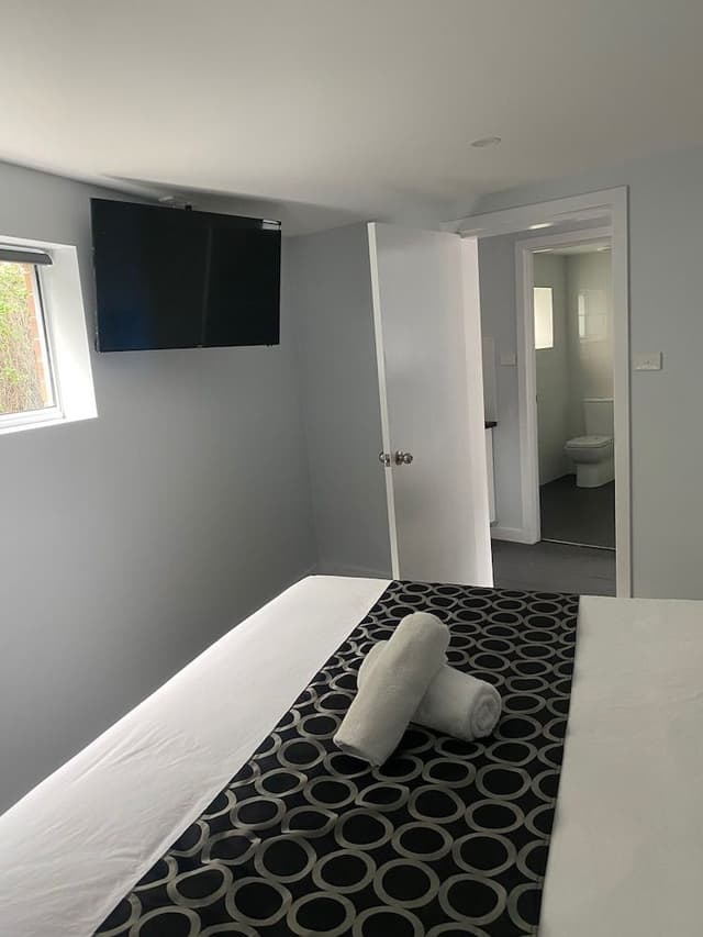 Family Room with King + 3 Single Beds + Kitchenette