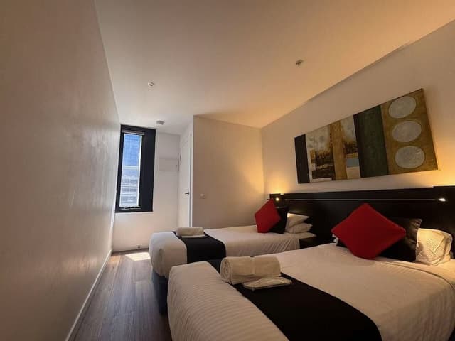 Two Bedroom Two Bathroom Apartment with 4 Single beds