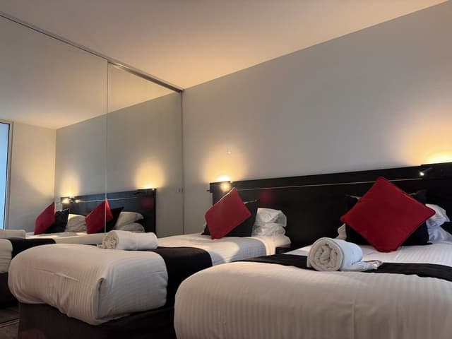 Two Bedroom Two Bathroom Apartment with 4 Single beds