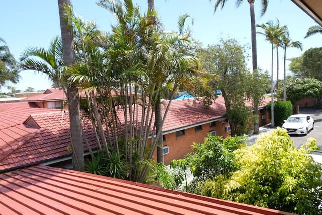Deluxe Queen with Balcony Upstairs Room - 1 Queen and 1 Single Bed