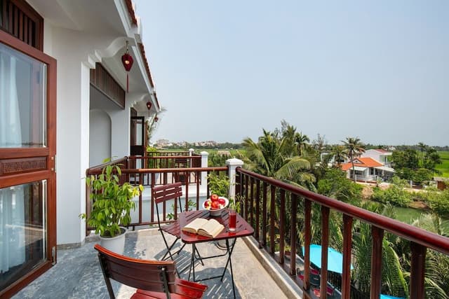 Junior Triple Room with Balcony and View