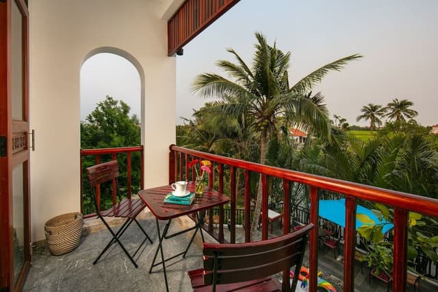 Junior Triple Room with Balcony and View
