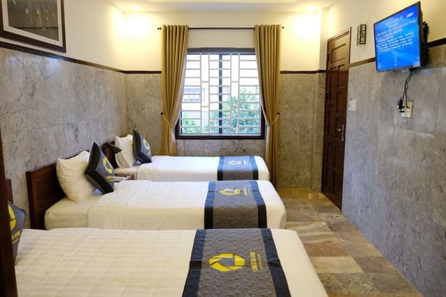 Deluxe Triple Room
