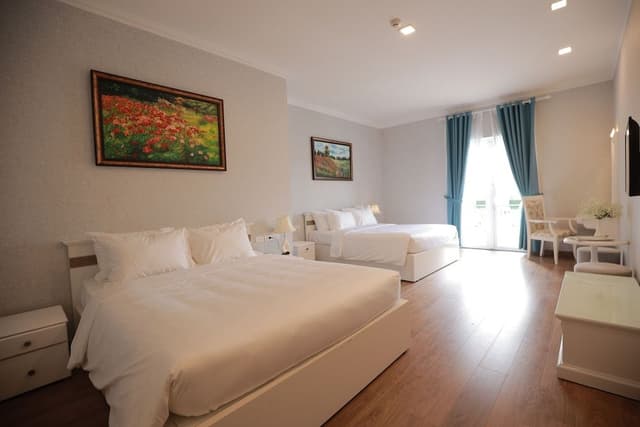 Deluxe Quadruple Room, 2 Queen Beds