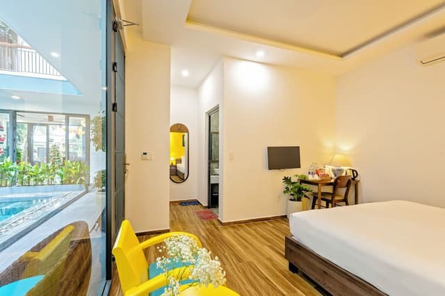 Deluxe Queen Balcony with Pool View