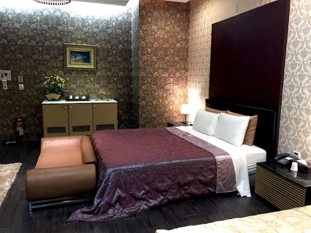 Deluxe Quadruple Room, 2 Queen Beds, Jetted Tub