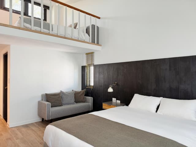 Deluxe Quadruple Room with Balcony