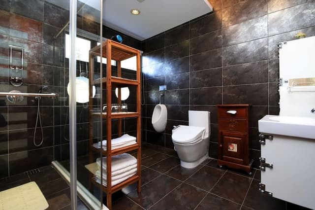 Modern style building- Deluxe Quadruple Room, 2 Queen Beds, Balcony