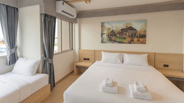 Deluxe Triple Room