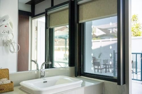 สิงหราชบูทีค โฮเต็ล (Singharaj Boutique Hotel)4