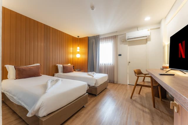 Twin Bed with City View