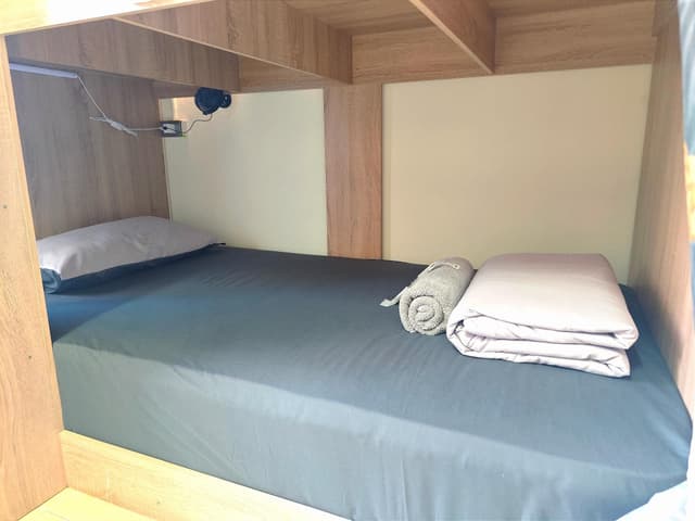 Single Bed in Dormitory with Shared Bathroom