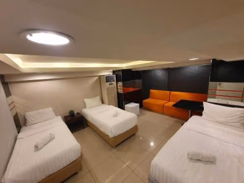 Triple Room Shared Bathroom