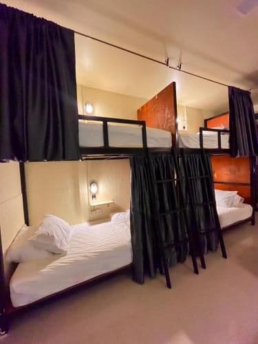 Bed in 8 Bed Mixed AC Dormitory Room with Shared Bathroom