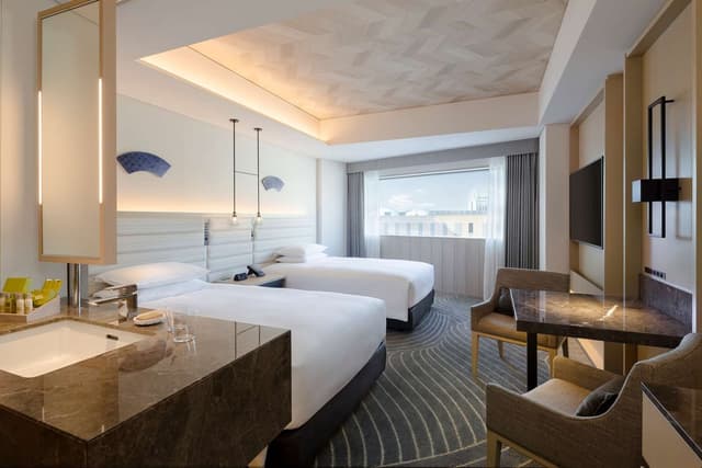 TWO DOUBLE BEDS DELUXE ROOM