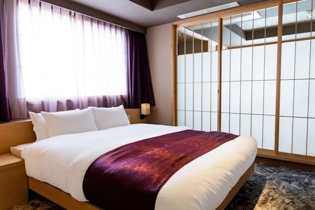 Deluxe Quad Room