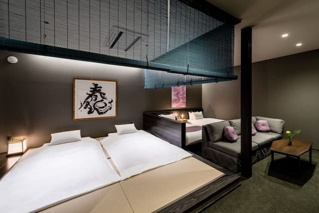 Deluxe Quadruple Room, Non Smoking, Private Bathroom, Courtyard View