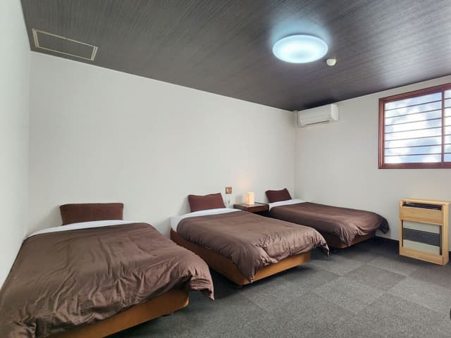 Triple Room, Non Smoking, Shared Bathroom