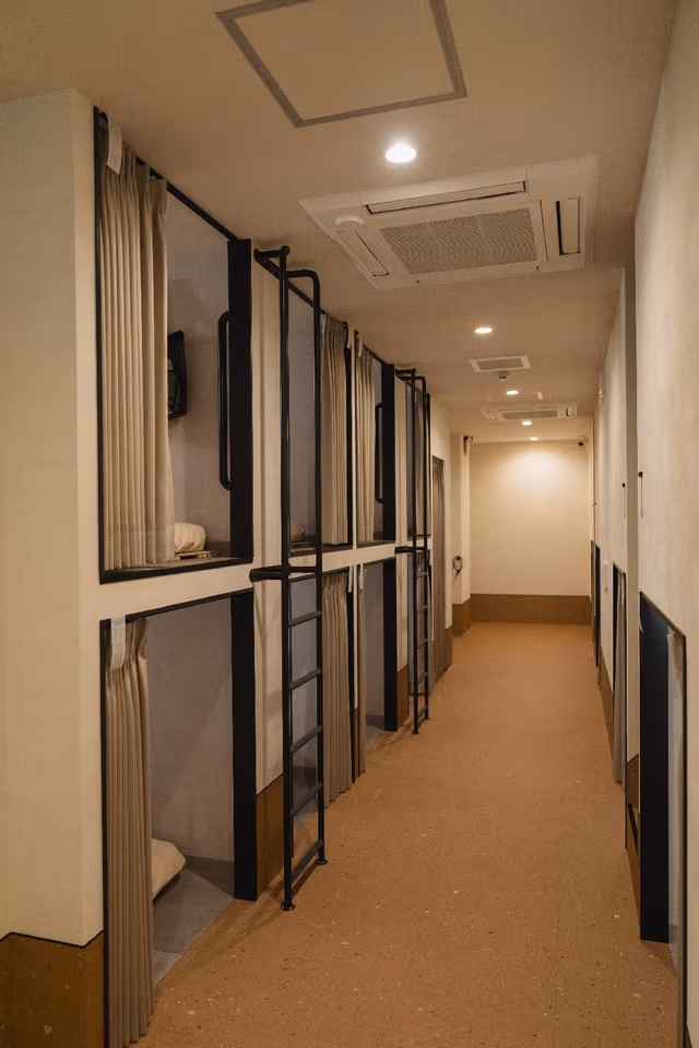 Capsule with Shared Bathroom
