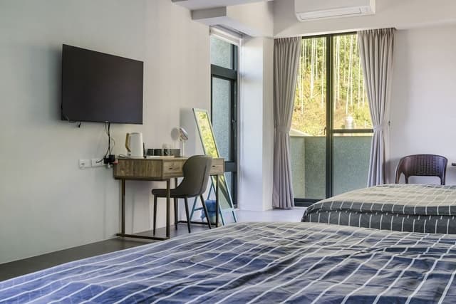 Deluxe Quadruple Room with Balcony