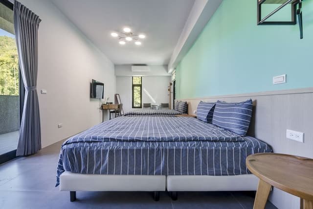 Deluxe Quadruple Room with Balcony