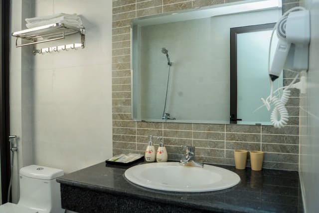 Deluxe Triple Room, City View