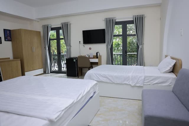 Deluxe Triple Room, Balcony, City View