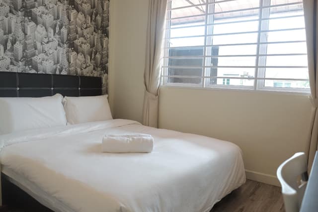 Queen Room with Shared Bathroom