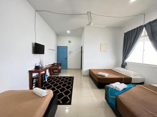 อิไบบีช เกสต์เฮ้าส์ (IBAI BEACH GUESTHOUSE)4
