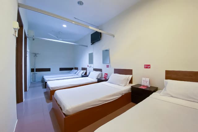 A Bed in All-Male Dormitory Bedroom