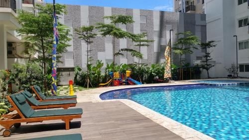 Studio at Signature Park Grande Apt By Travelio0