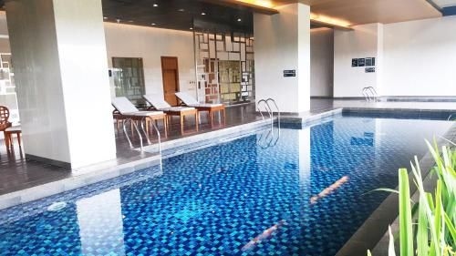 สเปเชียส สตูดิโอ แอท เกอมัง วิลเลจ บาย ทราเวลลิโอ (Spacious Studio at Kemang Village By Travelio)0