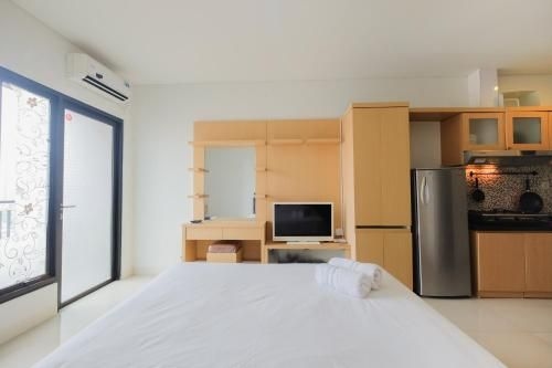 โคซี่สตูดิโอ แอท ทามันซารี เซมังกี อพาร์ทเมนท์ บาย ทราเวลิโอ (Cozy Studio at Tamansari Semanggi Apt by Travelio)1