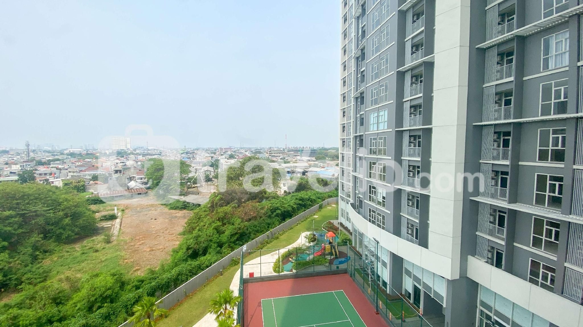 HomeyWarm 1BR at Ciputra International By Travelio0