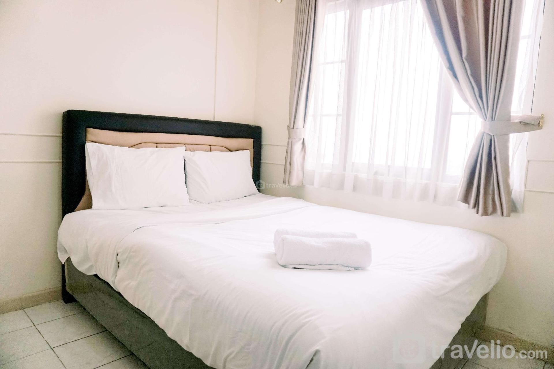 เอลีแกนต์ คอมฟอร์เทเบิล 2BR ปูรี การ์เดน บาย เทรเวลิโอ (Elegant Comfortable 2BR Puri Garden By Travelio)2
