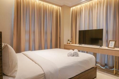 อพาร์ทเมนท์ 2 ห้องนอนสุดหรู ซิตราเลค สวีท โดย โดย ทราเวลิโอ (Elegant 2BR Citralake Suites Apartment By Travelio)1