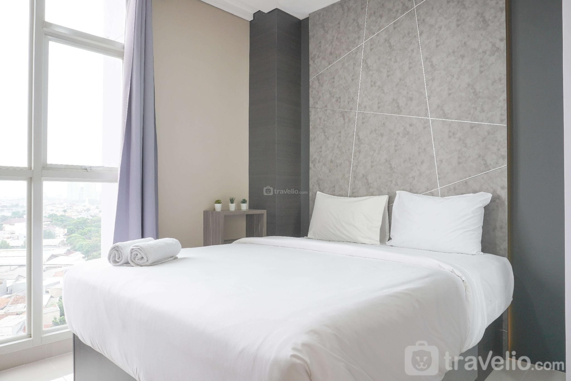 ที่พักทันสมัย 2 ห้องนอน ซิปุตรา อินเตอร์เนชั่นแนล โดย ทราเวลลิโอ (Modern Stay 2BR Ciputra International By Travelio)4