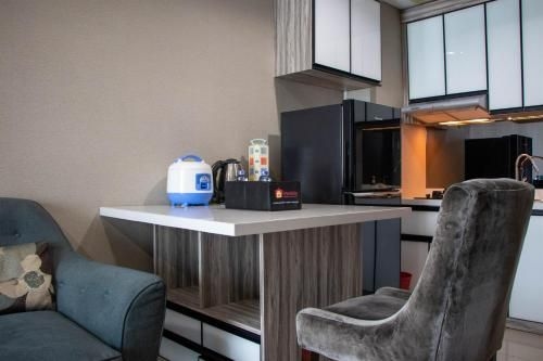 สปริงฮิลล์ เทอเรซ 2 ห้องนอนที่หรูหราและสะดวกสบาย โดยทราเวลิโอ (Elegant Comfy 2BR Springhill Terrace By Travelio)1