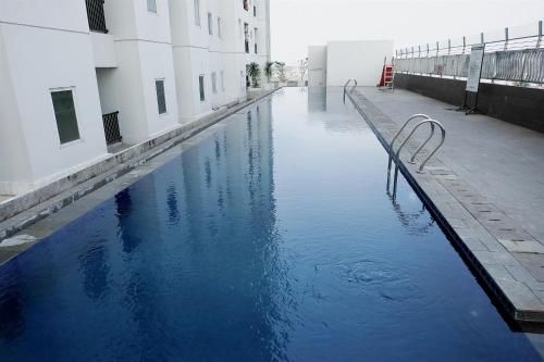 1 ห้องนอน 1 ห้องน้ำส่วนตัว ขนาด 31 ตร.ม. – อันคอล (Elegant 1BR Northland Ancol Apartment By Travelio)0