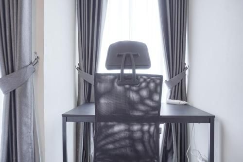 Cozy Studio at Tifolia Apartment By Travelio0