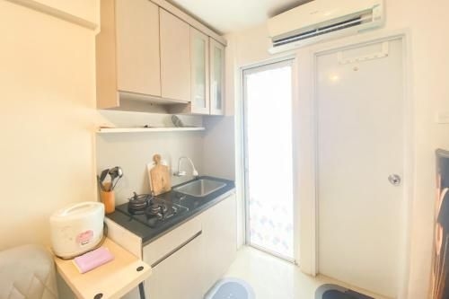 Beautiful and Cozy 2BR Bassura City By Travelio0