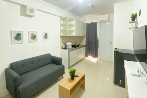 Full Furnished Homey 2BR Bassura City By Travelio3