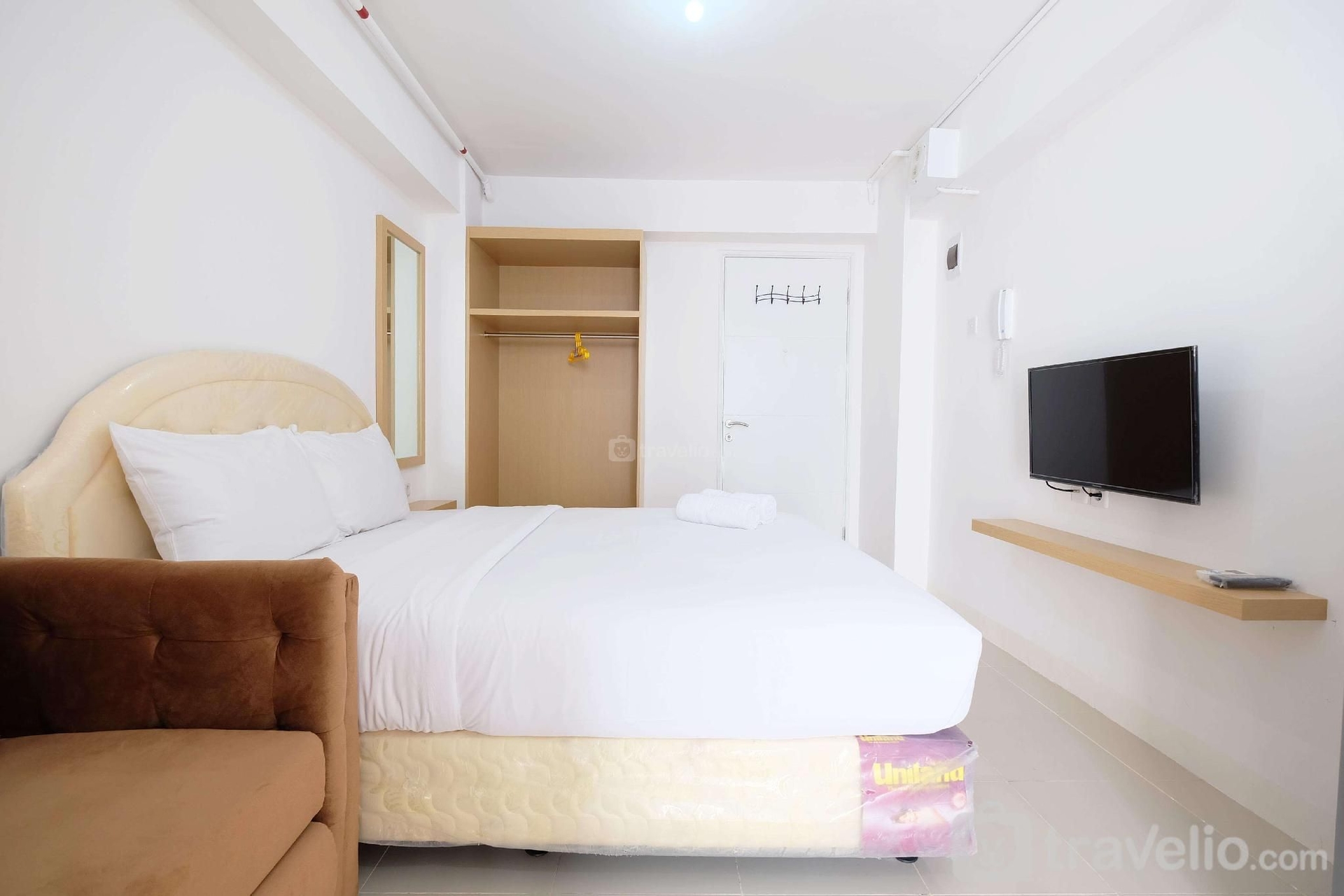 Studio with Sofa Bed @ Bassura City Apt - Travelio1