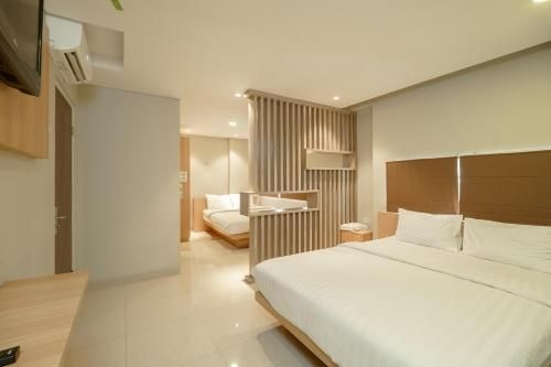 Green Apple Residence Near Sarinah Mitra Reddoorz1