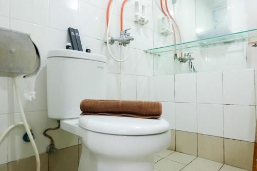 Modern 2BR With City View At Bassura Apartment By Travelio4