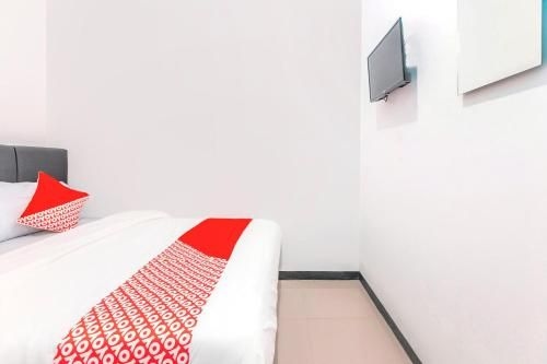 ซูเปอร์ โอโอวายโอ 2223 เจแอนด์บี รูม อูตัน คายู (Super OYO 2223 J&b Room Utan Kayu)3